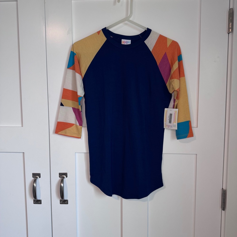 NWT LuLaRoe Randy Raglan Blue Shirt w/ Multicolor Sleeves Geometric Women's XS